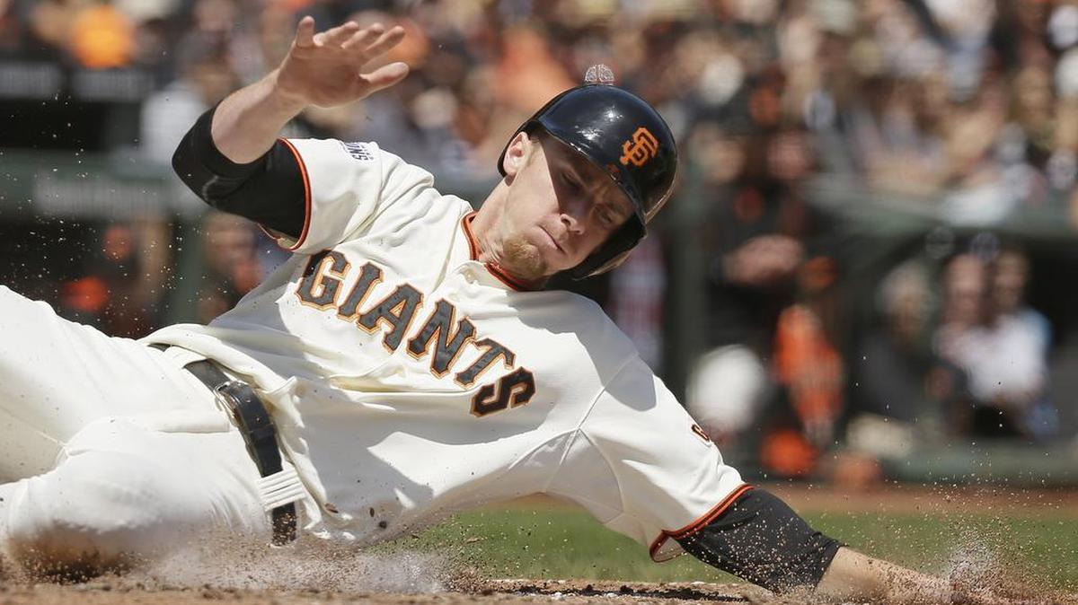 
San Francisco Giants’ Matt Duffy scores the Giants’ first run after Nori Aoki singled on a line drive to center field in the third inning against the San Diego Padres Wednesday, May 6, 2015, in San Francisco.
