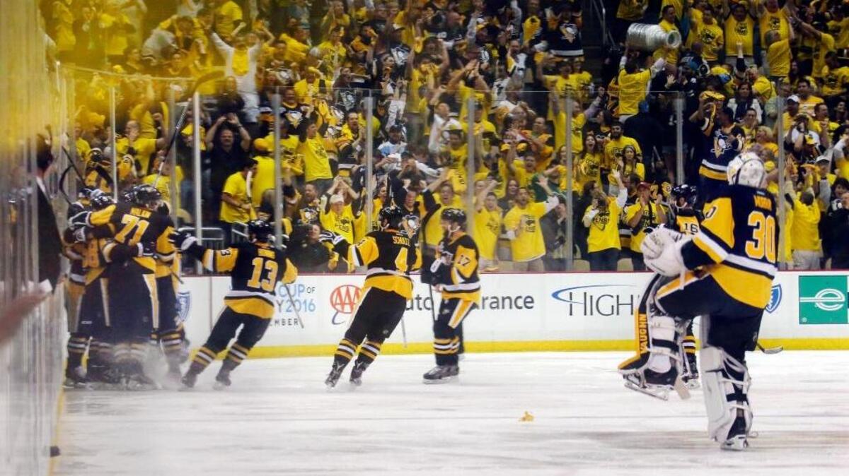 Pittsburgh fans go crazy after Conor Sheary’s overtime goal gave the Penguins a 2-1 victory and a 2-0 lead in the Stanley Cup Final.