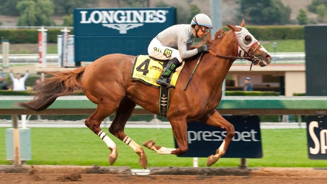 California Chrome and jockey Victor Espinoza win the Grade II, $200,000 San Pasqual Stakes horse race Saturday, Jan. 9, 2016, at Santa Anita in Arcadia.