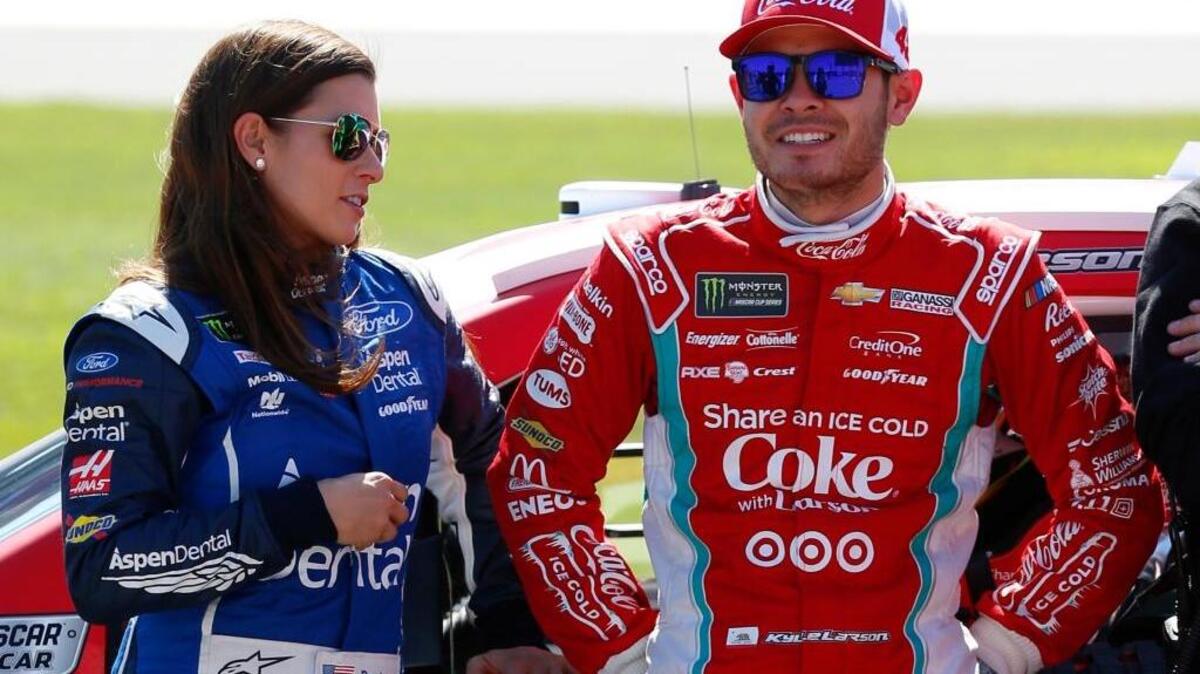 Kyle Larson, the Monster Energy NASCAR Cup Series points leader, speaks with fellow NASCAR driver Danica Patrick on Saturday in Talladega, Ala. The Elk Grove native finished 12th Sunday.