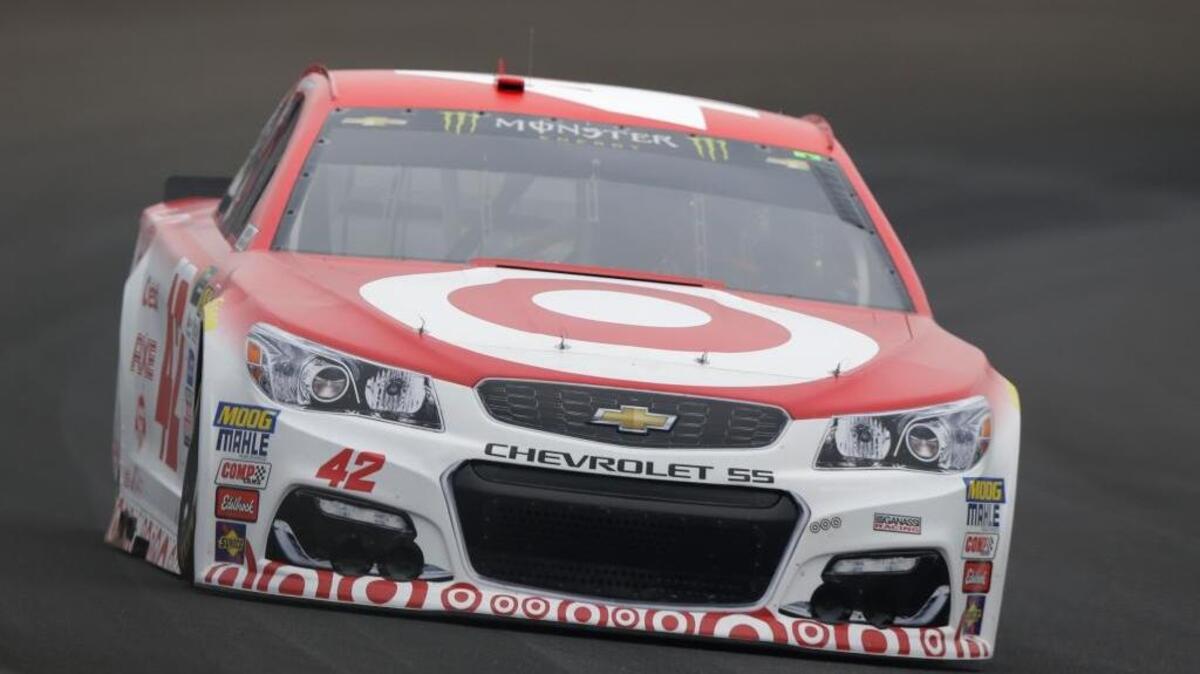 Race driver Kyle Larson (42) drives through the first turn during practice for the NASCAR auto race at Indianapolis Motor Speedway, in Indianapolis Saturday, July 22, 2017.