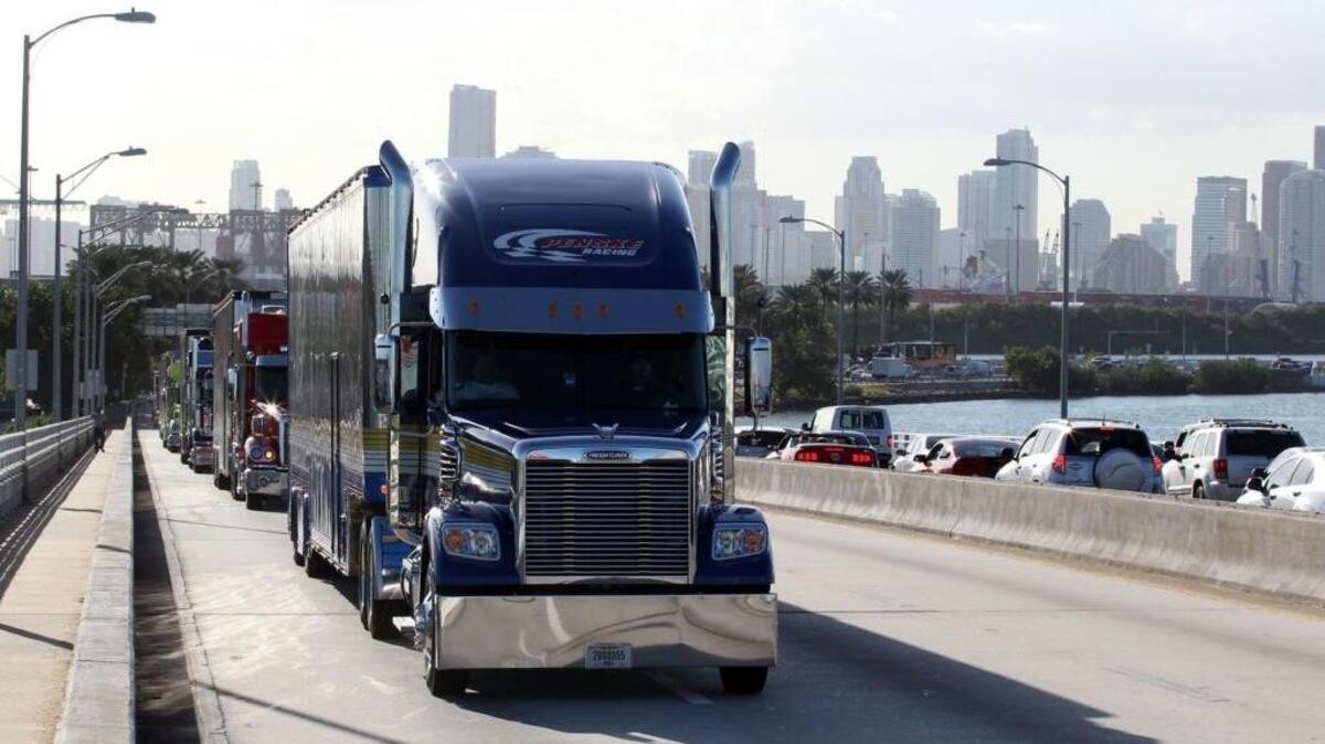 NASCAR haulers form a procession on their way to Homestead-Miami Speedway. The haulers will have their own parade Thursday in Sacramento.