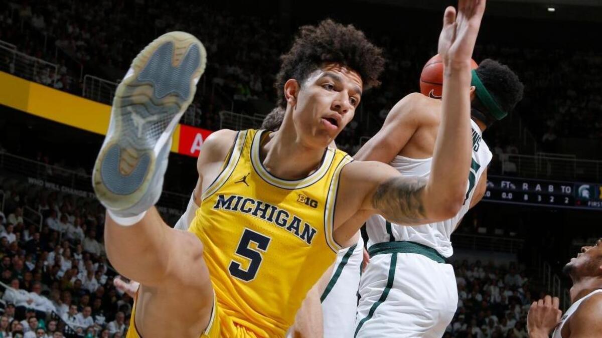 Michigan’s D.J. Wilson (5) was selected by the Milwaukee Bucks with the 17th pick of the NBA draft Thursday. Wilson is a Capital Christian High School graduate.