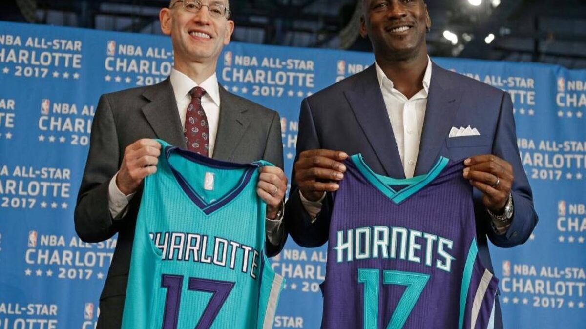 NBA commissioner Adam Silver, left, and Charlotte Hornets owner Michael Jordan announce the league’s All-Star Game will be played in Charlotte, N.C., in 2017. However, a discriminatory state law prompted the NBA to change cities. On Wednesday, the NBA agreed to let Charlotte host the game in 2019.