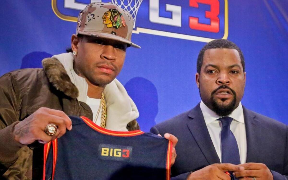Former NBA All-Star Allen Iverson, left, shows his jersey with entertainer Ice Cube after they announced the launch of BIG3, a 3-on-3 professional basketball league, on Jan. 11 in New York. The league will hold its lottery and draft next week.