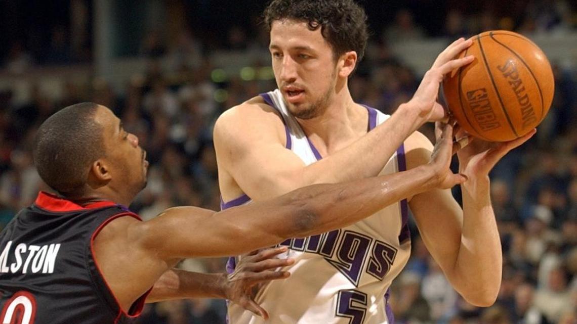 FILE -- Kings forward Hedo Turkoglu is guarded by Raptors Rafer Alston during the fourth quarter at Arco Arena, Friday, March 14, 2003. Current Knicks center Enes Kanter has been charged by the Turkish government of insulting Turkoglu via social media; Kanter will be tried in absentia in Turkey.
