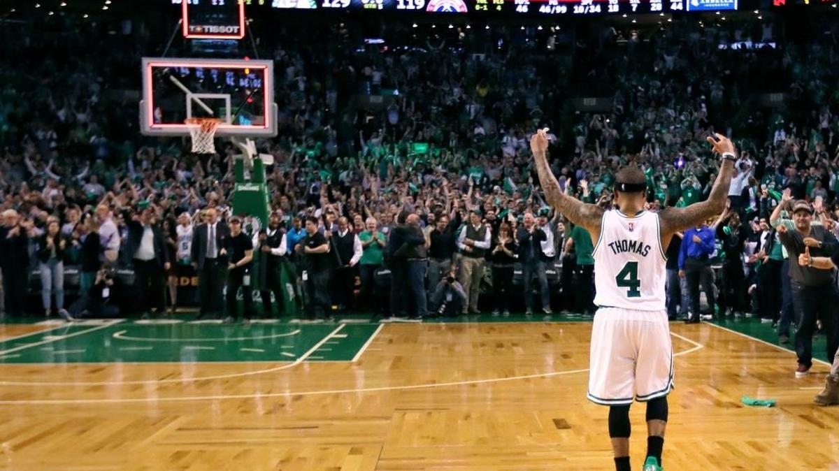 Boston Celtics guard Isaiah Thomas celebrates Tuesday after a Game 2 win over the Washington Wizards in the Eastern Conference semifinals. Thomas scored a career-high 53 points in the 129-119 overtime victory in Boston.