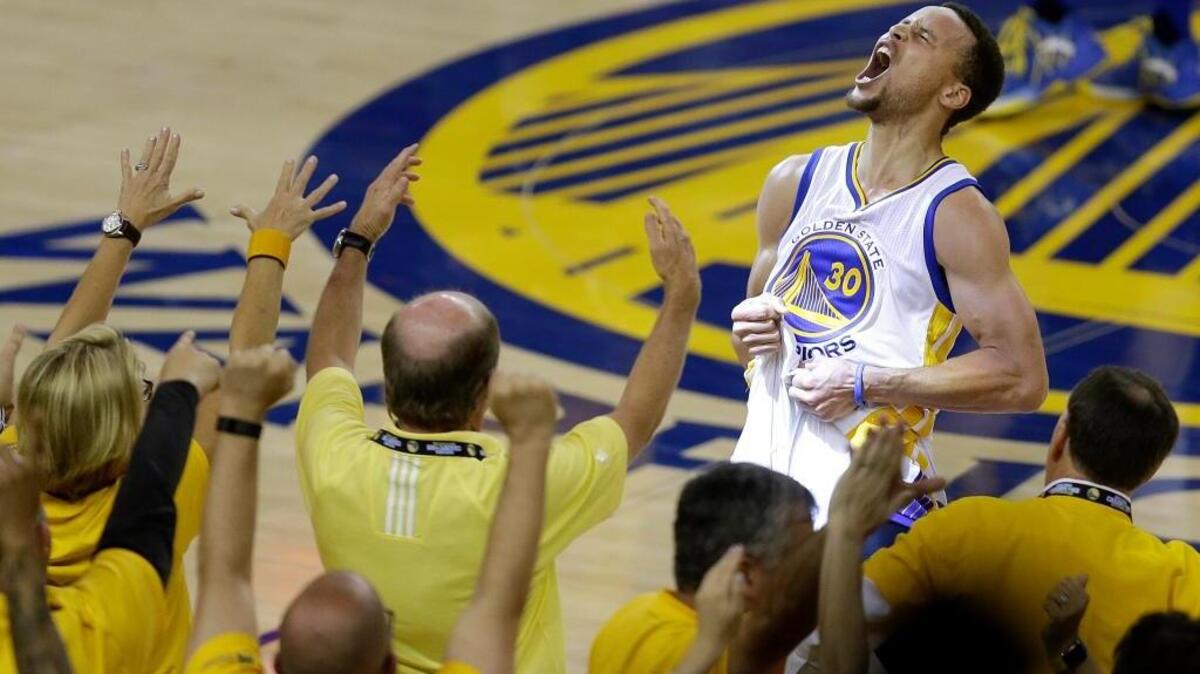FILE - In this May 30, 2016, file photo, fans cheer as Golden State Warriors guard Stephen Curry yells after the Warriors defeated the Oklahoma City Thunder in Game 7 of the NBA basketball Western Conference finals in Oakland, Calif. One of the NBA's biggest bargains until now, Curry is about to receive his massive payday. Golden State general manager Bob Myers said Friday, June 30, 2017, the Warriors will finalize a contract with the two-time MVP once the free agency moratorium ends July 6.