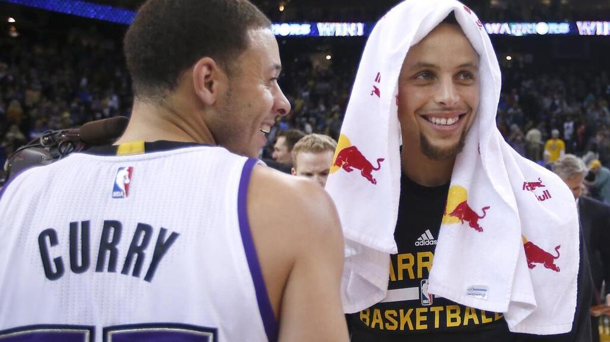 Sacramento Kings guard Seth Curry was at Oracle Arena on Monday supporting his brother, two-time league MVP and Warriors guard Stephen Curry. The brothers share a laugh after an NBA basketball game Saturday, Nov. 28, 2015, in Oakland, Calif. The Warriors won 120-101.