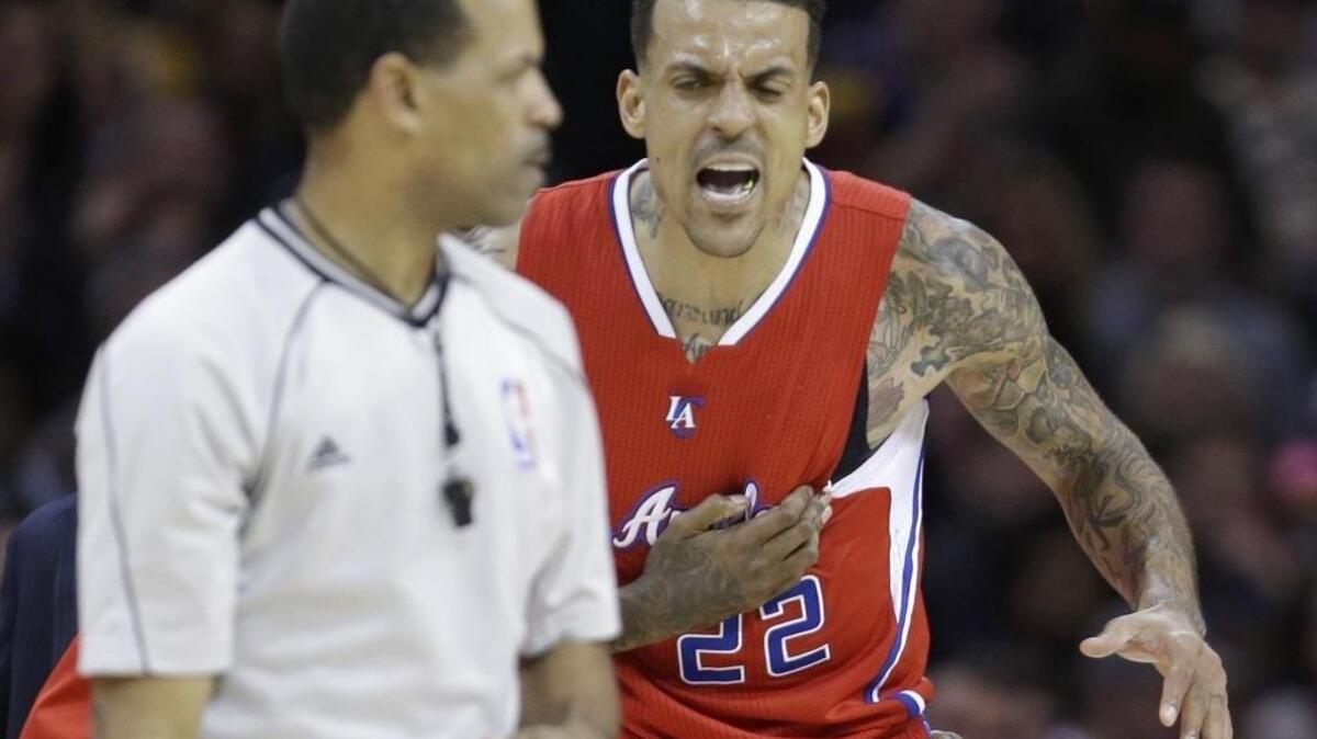 
Los Angeles Clippers’ Matt Barnes, right, yells at official Eric Lewis after being ejected from the game during the third quarter of an NBA basketball game against the Cleveland Cavaliers Thursday, Feb. 5, 2015, in Cleveland.
