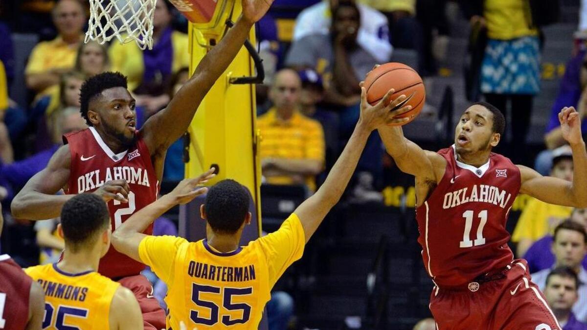 Kings first-round draft pick, Oklahoma guard Isaiah Cousins (11), believes his perimeter game could complement the bruising play of DeMarcus Cousins in the paint. ... Cousins blocks the shot of LSU guard Tim Quarterman (55) as Oklahoma forward Khadeem Lattin (12) comes in to help in the second half of an NCAA college basketball game, Saturday, Jan. 30, 2016 in Baton Rouge, La.
