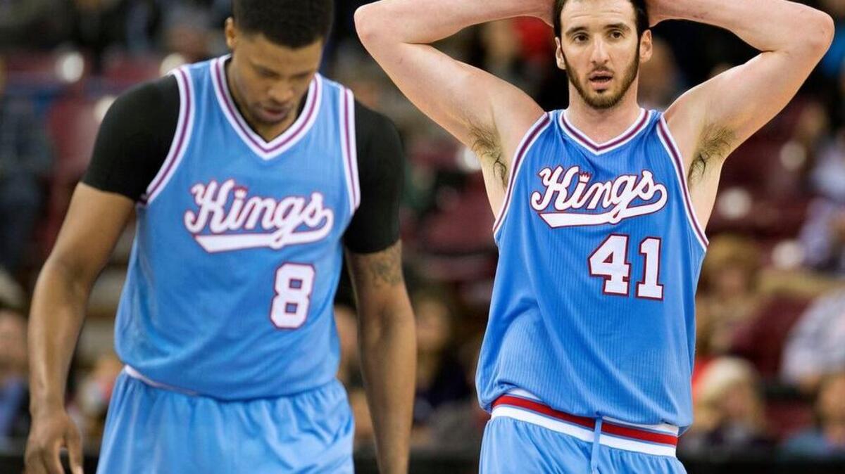 The Kings’ Rudy Gay, left, and Kosta Koufos (41) look dejected late in their 107-100 loss to the Orlando Magic on Friday, March 11, 2016, at Sleep Train Arena.