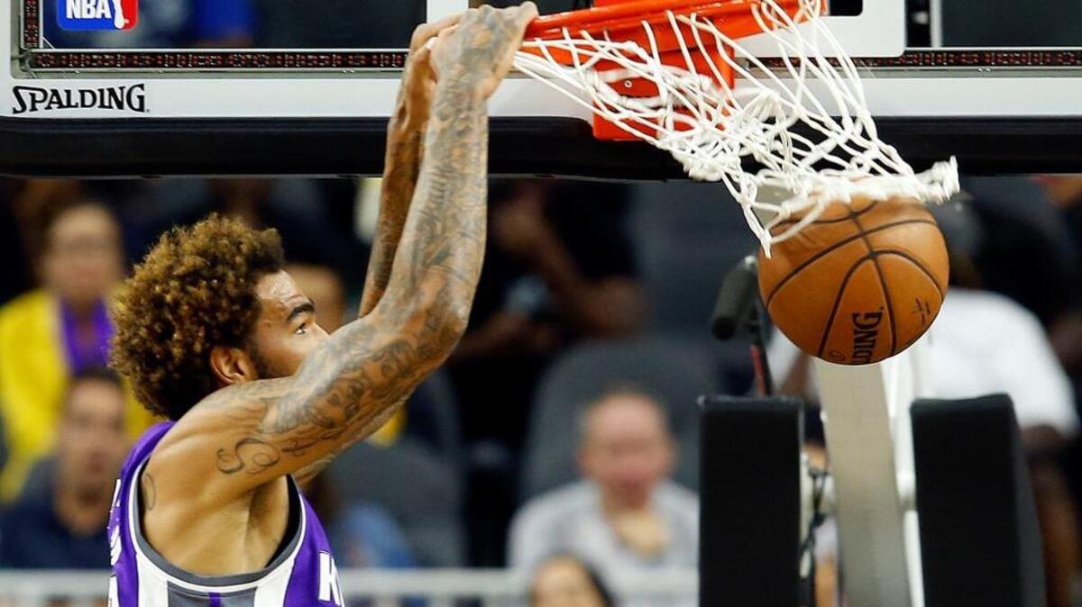 Sacramento Kings center Willie Cauley-Stein dunks during the first half of an NBA preseason basketball game against the Los Angeles Lakers on Thursday, Oct. 13, 2016, in Las Vegas. Cauley-Stein scored 12 points on 6-of-7 shooting.