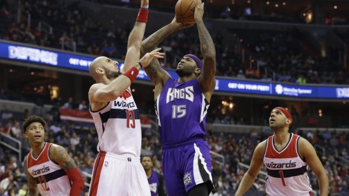 DeMarcus Cousins (15) leads the Sacramento Kings into action against the Indiana Pacers on Wednesday, Dec. 23, 2015, in Indianapolis.