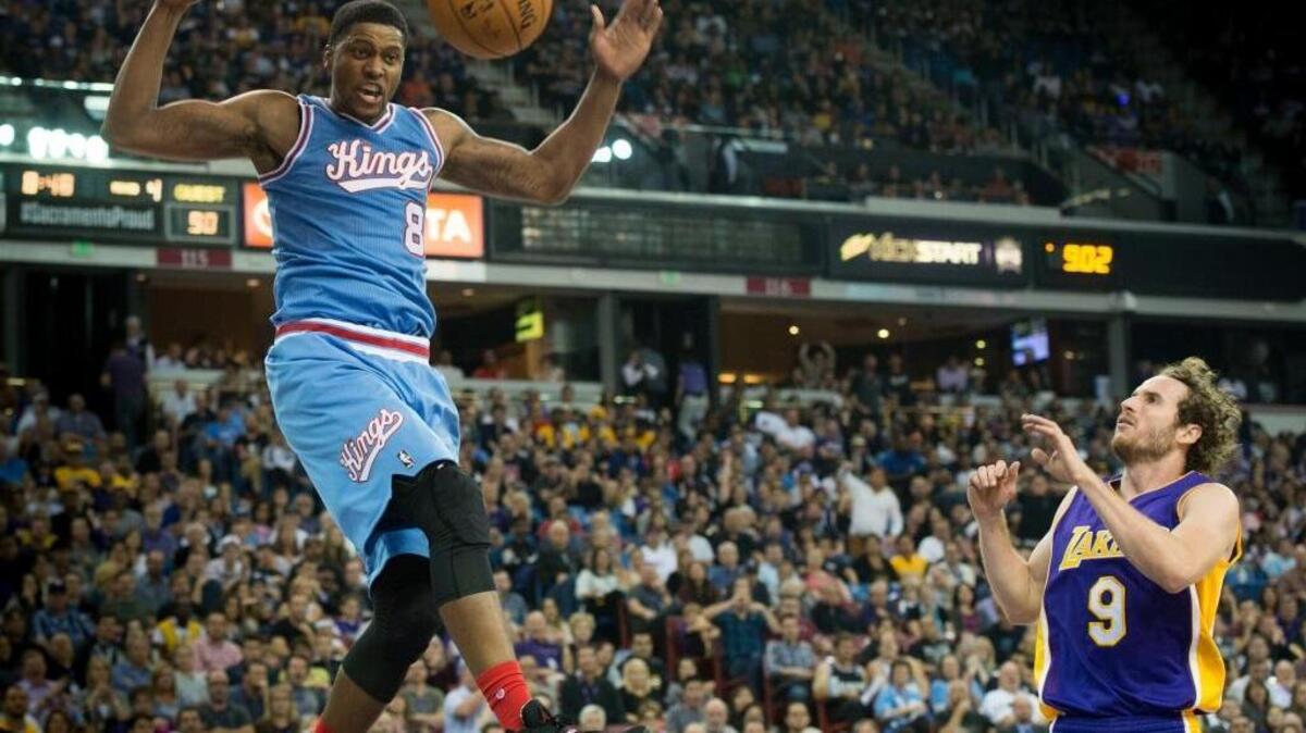 Kings forward Rudy Gay, left, celebrates a dunk as Los Angeles Lakers guard Marcelo Huertas looks on Friday, Oct. 30, 2015 at Sleep Train Arena in Sacramento, Calif. Gay is averaging 17.1 points, but is shooting just 40.5 percent and attempting 17.3 shots per game.