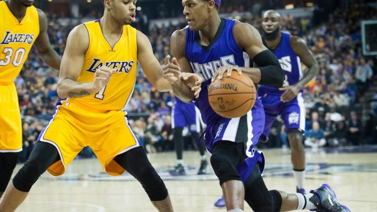 Kings guard Rajon Rondo goes to the basket against the Los Angeles Lakers’ D’Angelo Russell on Jan. 7, 2016 at Sleep Train Arena in Sacramento.