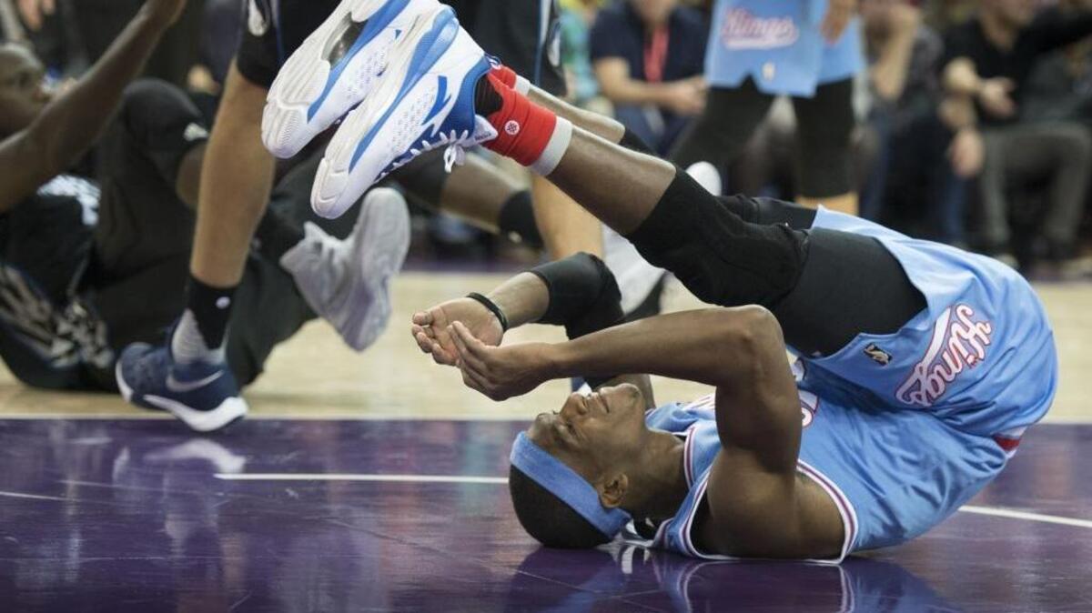 Guard Rajon Rondo (9) leads the Sacramento Kings back into action in Houston against the Rockets on Saturday, Dec. 5, 2015.