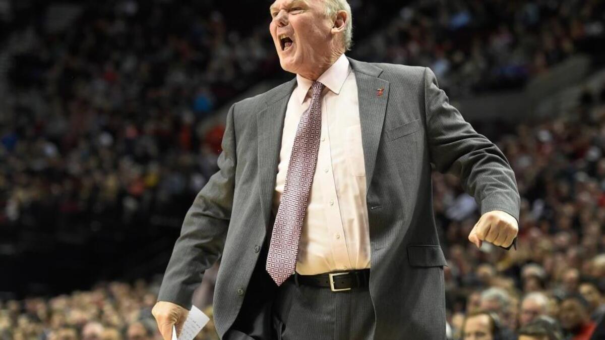 Kings head coach George Karl reacts to a call during the first half of an NBA basketball game against the Portland Trail Blazers in Portland, Ore., on Jan. 26, 2016. Karl received a technical foul.