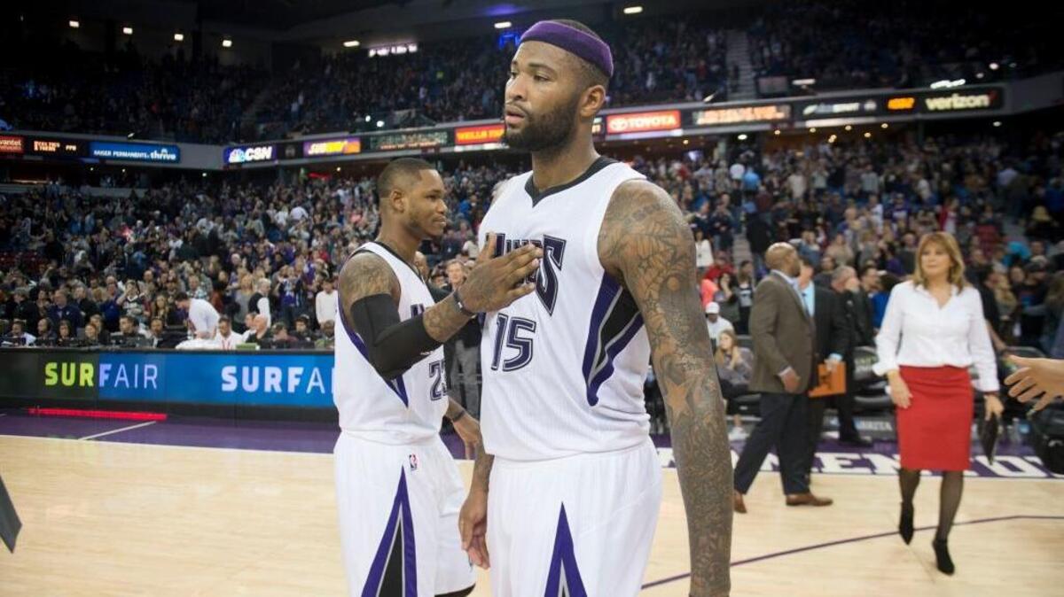 Sacramento Kings guard Ben McLemore (23) congratulates teammate Sacramento Kings center DeMarcus Cousins (15) after his career-high 48 points against the Indiana Pacers in an NBA basketball game on Saturday, Jan. 23, 2016 at Sleep Train Arena in Sacramento.
