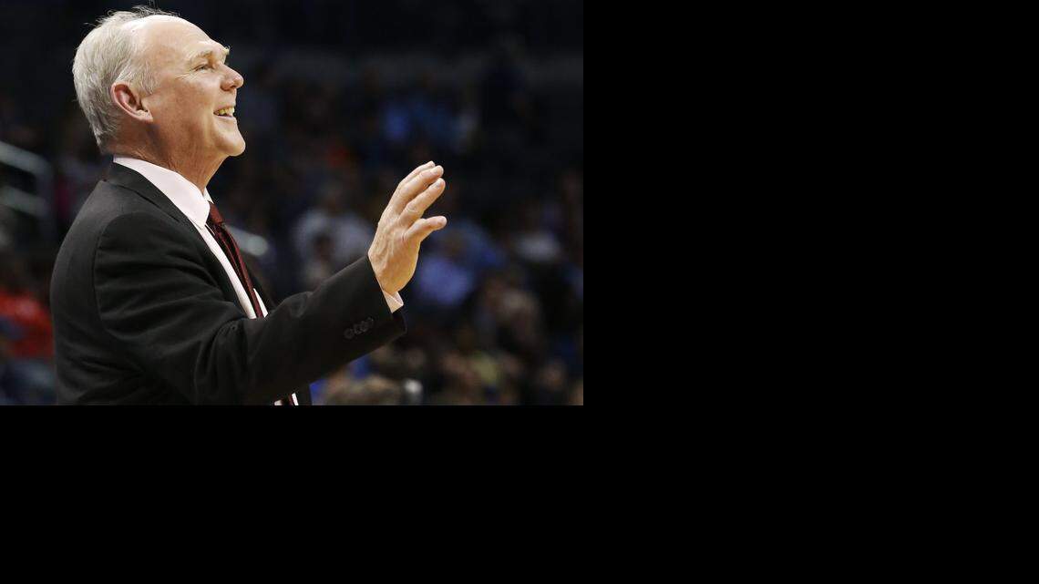 
George Karl smiles during the fourth quarter of an NBA basketball game against the Oklahoma City Thunder in Oklahoma City, Tuesday, March 19, 2013. 
