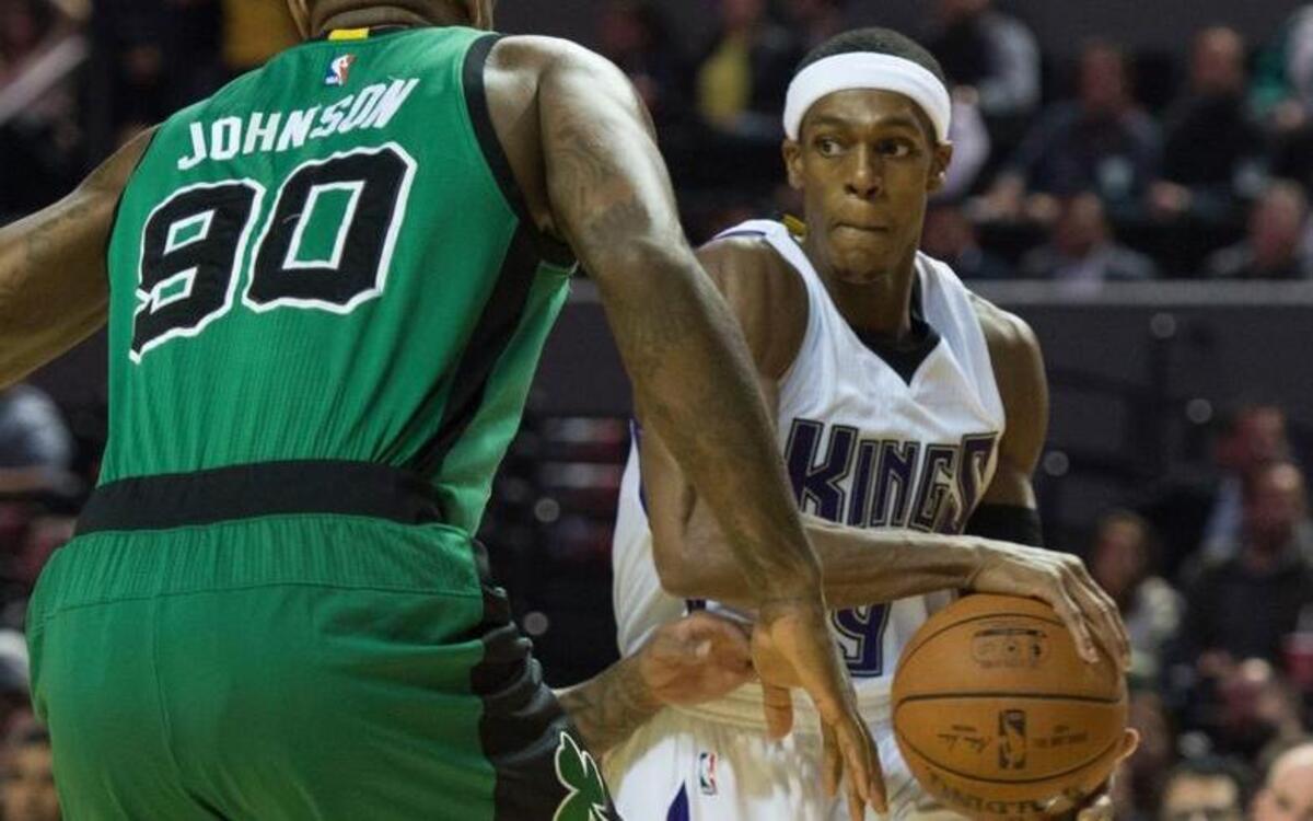 Kings guard Rajon Rondo (9) goes to the basket against Boston Celtics forward Amir Johnson (90) on Thursday, Dec. 3, 2015, at Mexico City Arena in Mexico City.