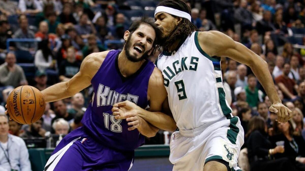 Kings forward Omri Casspi, left, is fouled by Milwaukee Bucks forward Chris Copeland in the first half Wednesday, Nov. 25, 2015, in Milwaukee. Casspi scored 19 points off the bench.