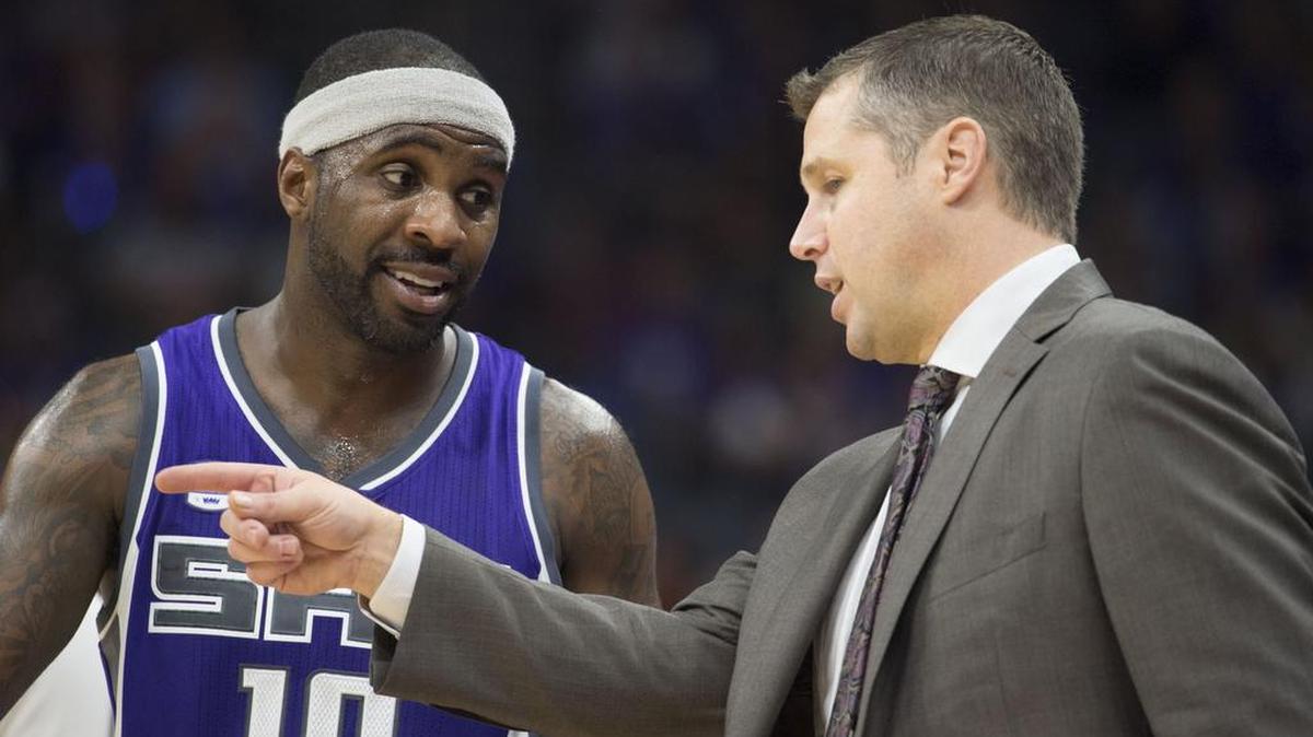 Sacramento Kings guard Ty Lawson (10) talks with Sacramento Kings head coach David Joerger during their home opener against the San Antonio Spurs at the Golden 1 Center in Sacramento on Thursday, October 27, 2016.