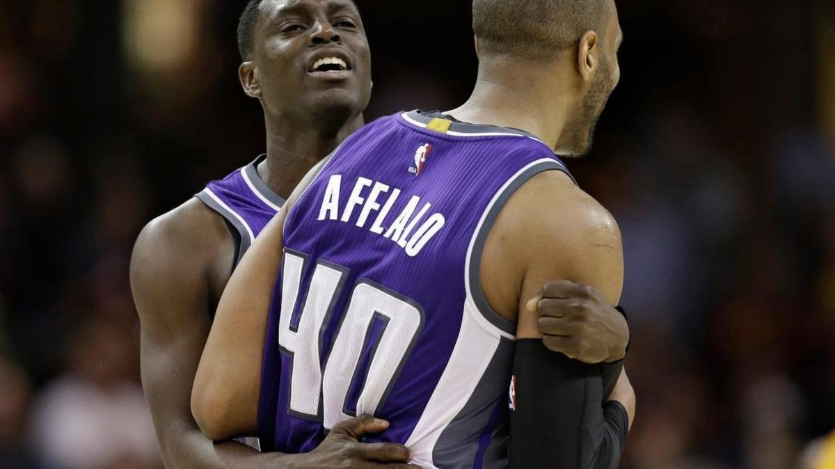 Sacramento Kings guard Darren Collison, left, hugs Arron Afflalo after Afflalo hit a 3-pointer in overtime during the team’s NBA basketball game against the Cleveland Cavaliers on Wednesday, Jan. 25, 2017, in Cleveland. The Kings won 116-112.