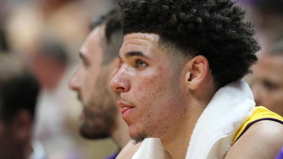 Los Angeles Lakers rookie point guard Lonzo Ball sits on the bench during a preseason game Sept. 30 in Anaheim. Fox will sit out Sunday against the Kings and possibly for the rest of the preseason.