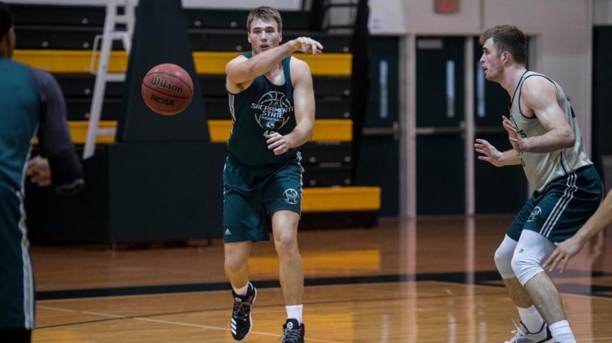 Sac State Hornets center Eric Stuteville passes the ball to a teammate during practice at Sac State on Tuesday, Nov. 1, 2016, in Sacramento, Calif.