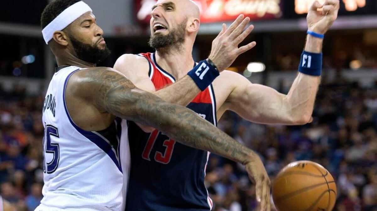 Sacramento Kings center DeMarcus Cousins (15) strips Washington Wizards center Marcin Gortat (13) of the ball during an NBA basketball game on Wednesday, March 30, 2016 at Sleep Train Arena in Sacramento. Cousins’ night ended with 6.7 seconds left to play when he was called for a technical foul, his 16th of the season.