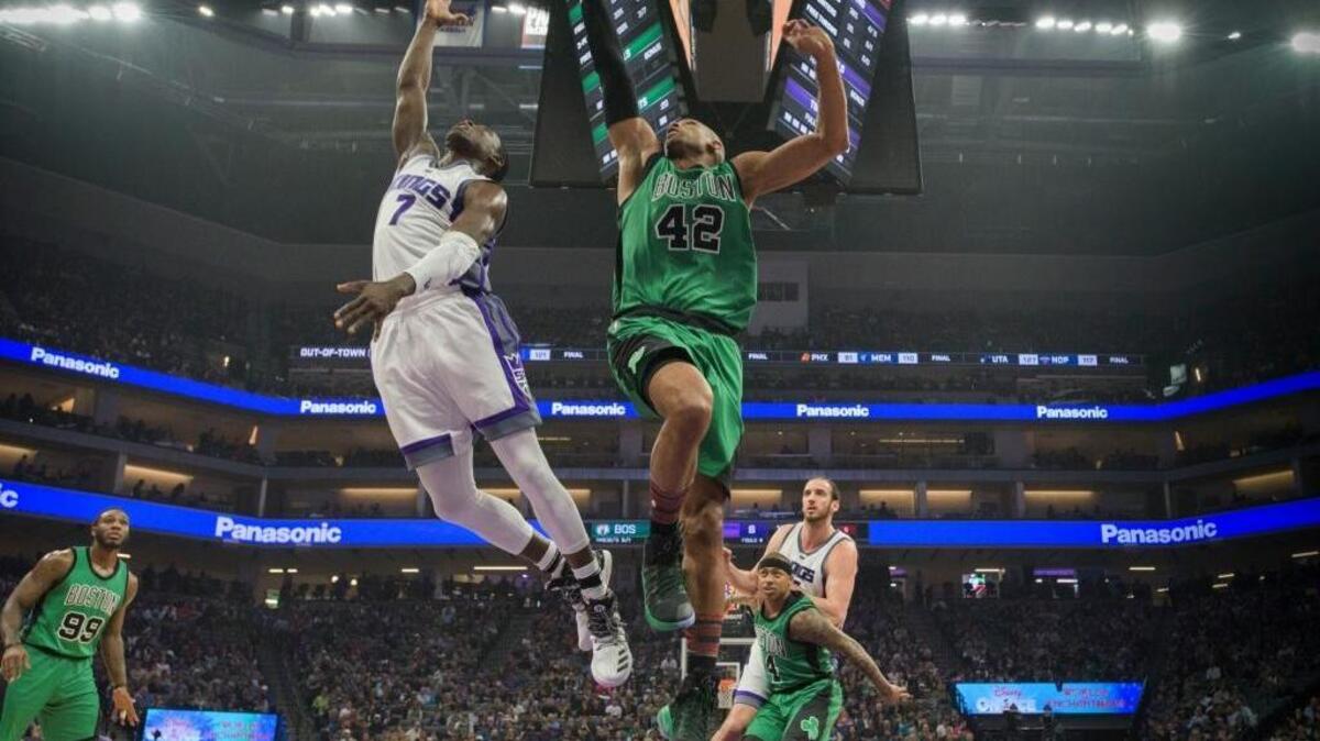 Darren Collison, left, led the Kings to a 108-92 victory over Al Horford, right, and the Boston Celtics at Golden 1 Center in Sacramento, California on Wednesday, February 8, 2017.