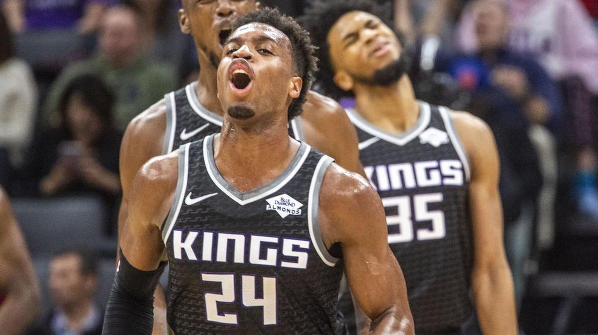 Sacramento Kings guard Buddy Hield (24) and teammates Sacramento Kings forward Harry Giles (20) and Sacramento Kings forward Marvin Bagley III (35) react to a foul call against teammate Sacramento Kings guard De’Aaron Fox (5) as he defended the Philadelphia 76ers on Saturday, Feb. 02, 2019 at the Golden 1 Center in Sacramento.