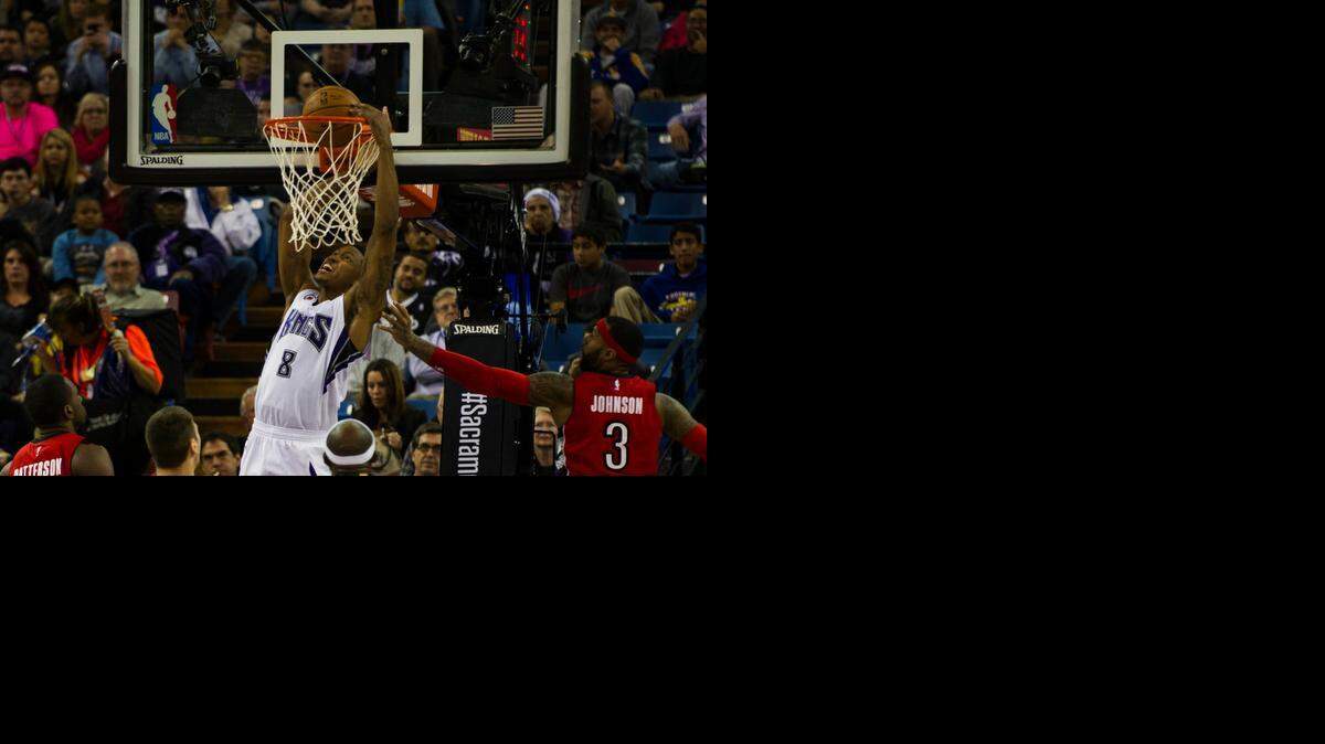
Sacramento Kings forward Rudy Gay (8) dunks the ball during the second quarter at a game between the Sacramento Kings and Toronto Raptors on Tuesday, Dec. 2, 2014, at Sleep Train Arena in Sacramento, Calif.
