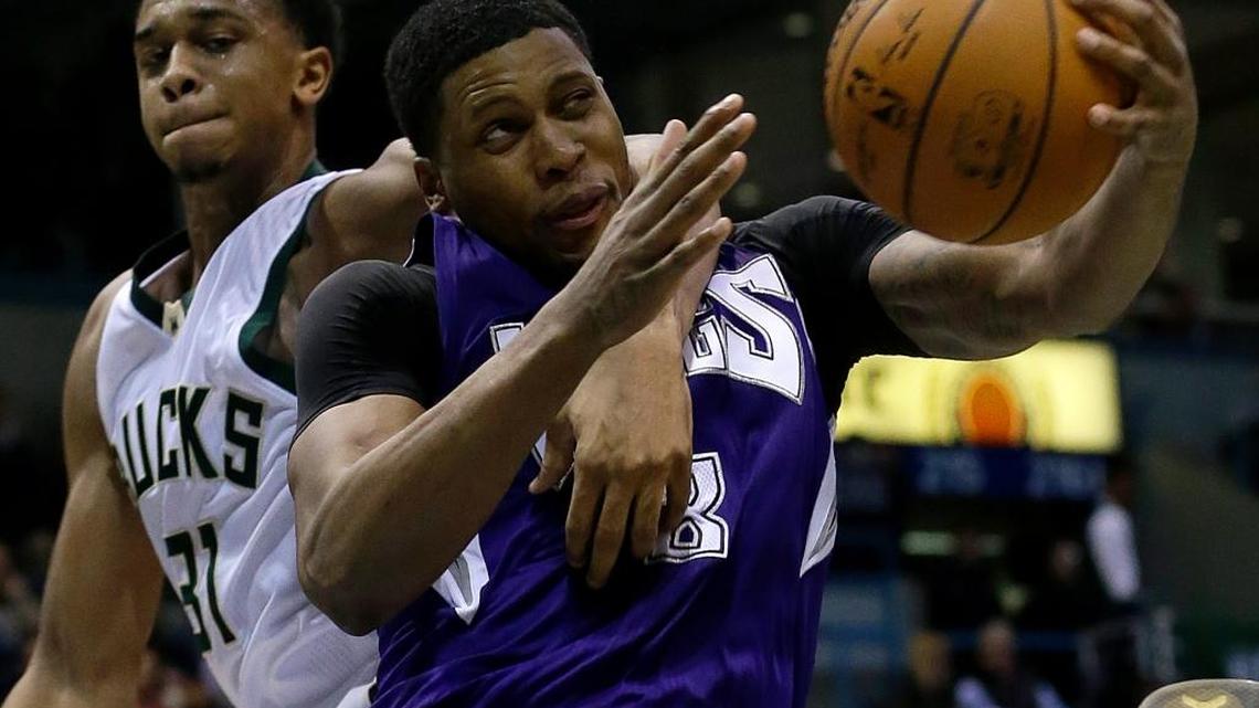 The Kings’ Rudy Gay is fouled by the Bucks’ John Henson (31) during the teams’ meeting on Nov. 25, 2015, in Milwaukee.