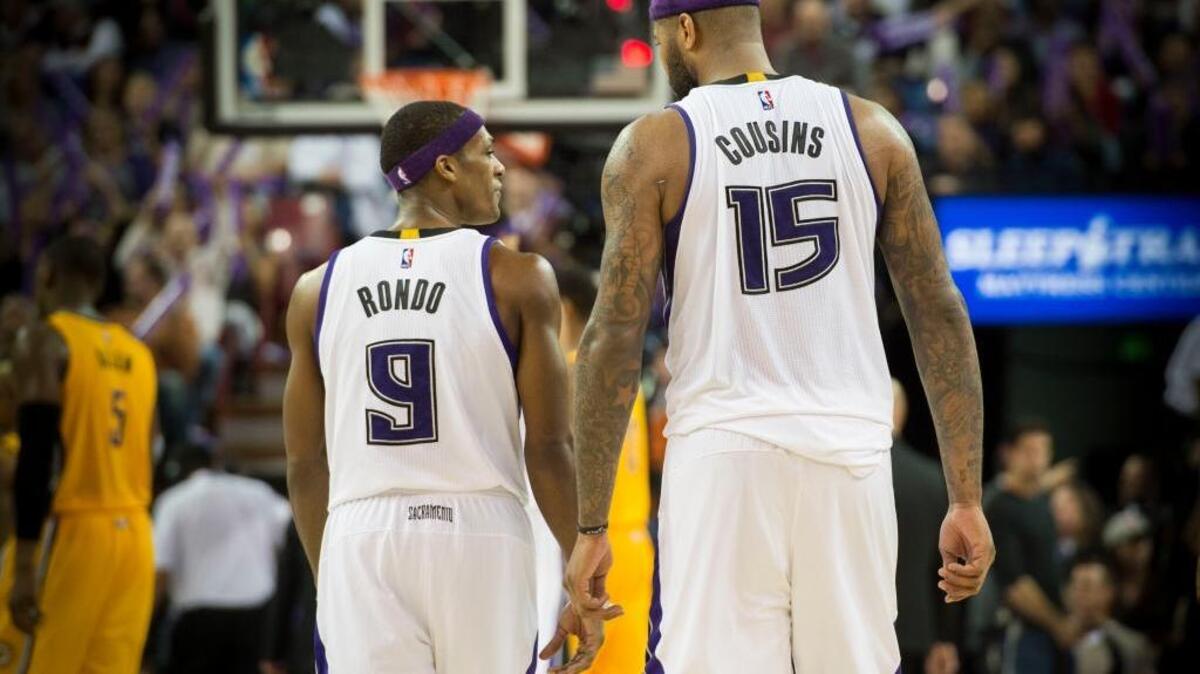 Sacramento Kings guard Rajon Rondo (9) and Sacramento Kings center DeMarcus Cousins (15) talk during an NBA basketball game on Saturday, Jan. 23 at Sleep Train Arena in Sacramento. Cousins is the NBA’s fourth-best scorer and rebounder and Rondo’s 11.9 assist per game is the best in the NBA.