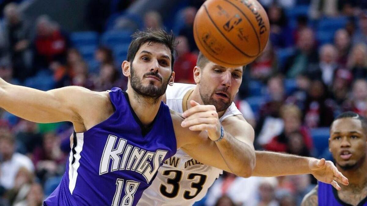 New Orleans Pelicans forward Ryan Anderson (33) vies for a loose ball against Kings forward Omri Casspi (18) in New Orleans, Thursday, Jan. 28, 2016. The Pelicans won 114-105.