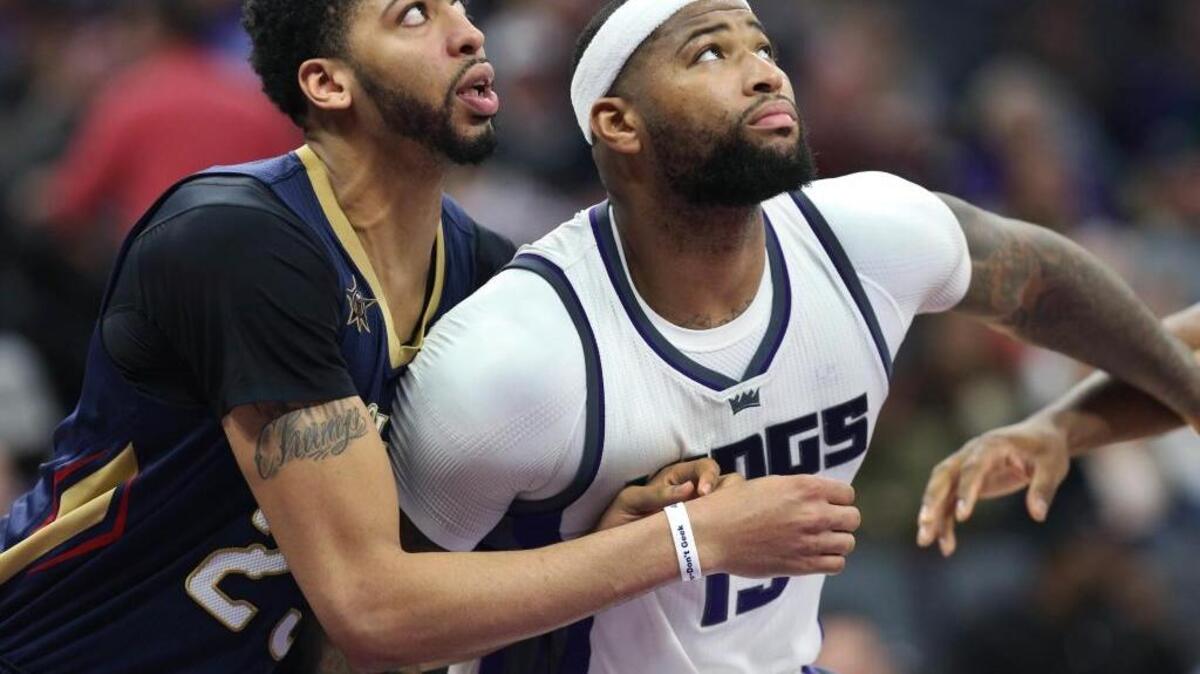 DeMarcus Cousins, right, and New Orleans’ Anthony Davis were opponents when the Pelicans met the Kings at Golden 1 Center on Feb. 12. The two are now teammates in New Orleans, where the Kings play Friday in the first meeting with Cousins since Sacramento traded him on Feb. 19.