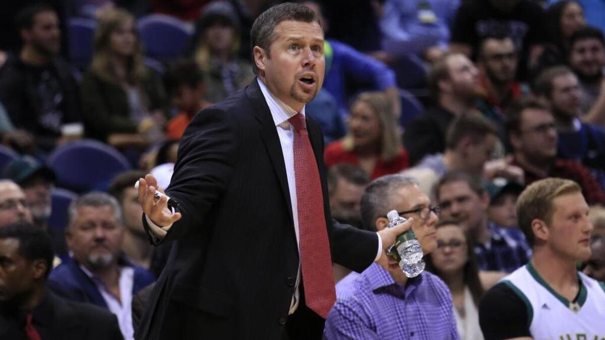Sacramento Kings head coach Dave Joerger reacts as his team takes on the Milwaukee Bucks during the first half of an NBA basketball game Saturday, Nov. 5, 2016, in Milwaukee.