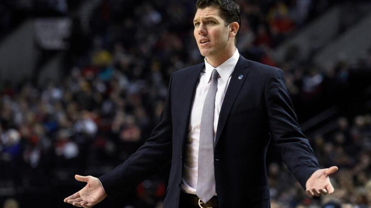 Golden State Warriors coach Luke won a state high school championship in 1998 in the Sacramento Kings’ current arena while playing for University High School of San Diego. ... Walton gestures during an NBA basketball game against the Portland Trail Blazers on Friday, Jan. 8, 2016 in Portland, Ore.