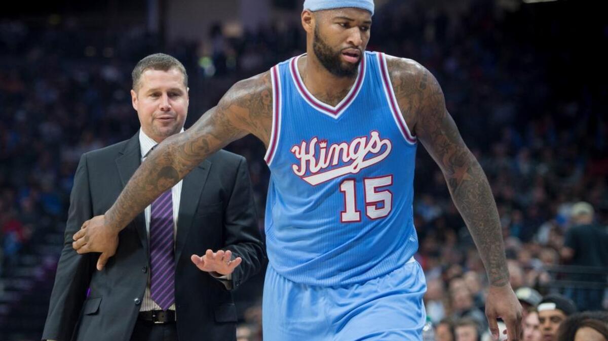 Sacramento Kings coach David Joerger likes the energy a smaller lineup provides, but playing Kosta Koufos with DeMarcus Cousins helps keep Cousins fresher later in the game. ... Joerger and Cousins look on during an NBA basketball game against the Los Angeles Clippers during their game at Golden 1 Center, Friday, November 18, 2016 in Sacramento.
