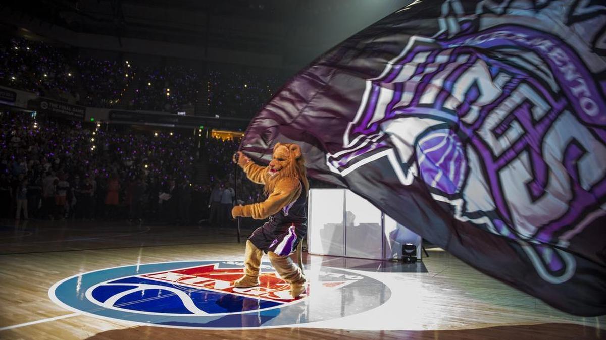 Slamson waves the flag during introductions at the Sacramento Kings’ last game at Sleep Train Arena on Saturday, April 9, 2016, in Sacramento, Calif