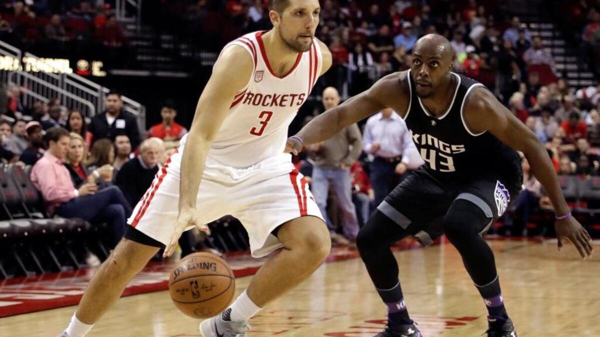 The Houston Rockets’ Ryan Anderson (Oak Ridge High School) drives toward the basket as the Kings’ Anthony Tolliver defends during the second half of Wednesday’s game in Houston. The Rockets won 132-98.