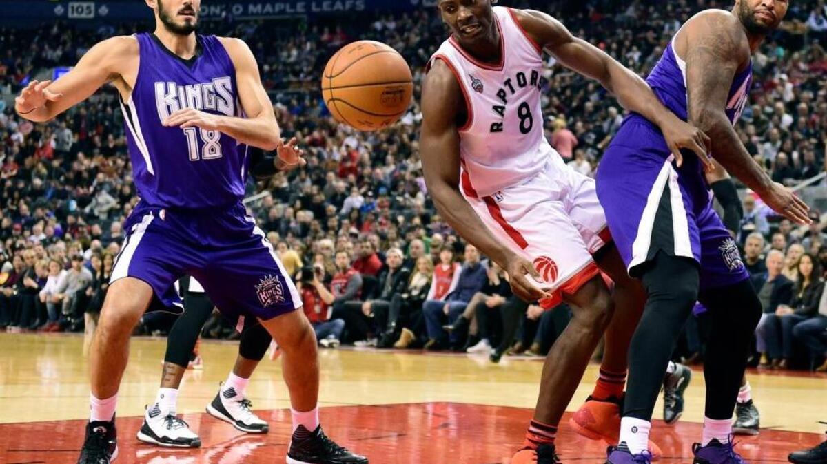NBC Sports calls DeMarcus Cousins, right, the face of the Kings franchise. ESPN notes, that Omri Casspi, left, is among the league’s best three-point shooters. ... The Toronto Raptors’ Bismack Biyombo goes for the ball during an NBA game in Toronto on Sunday, Dec. 20, 2015.