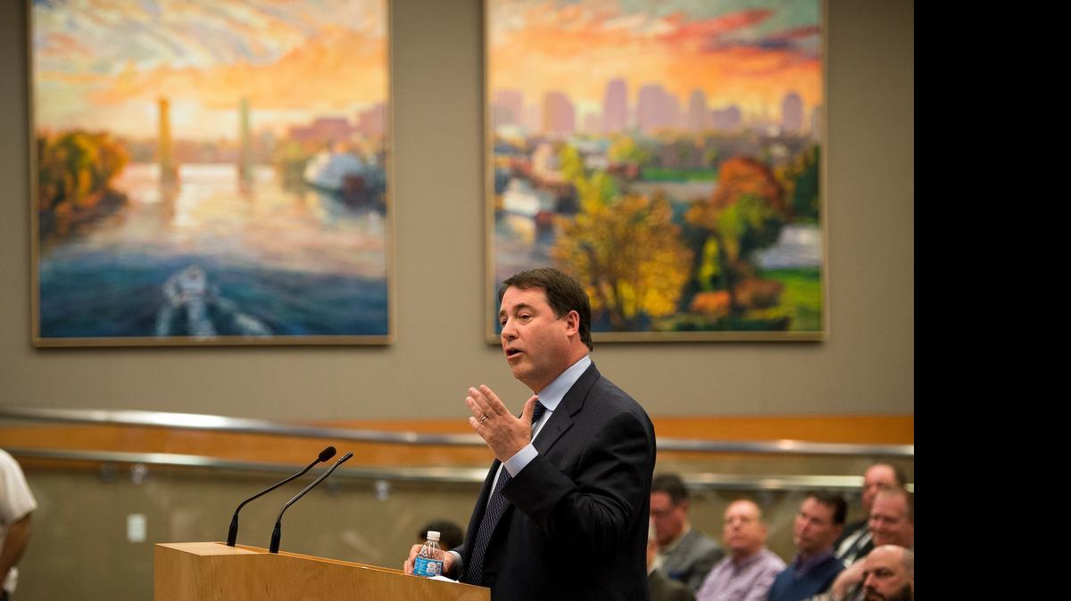 Darius Anderson speaks for Kings investors at a Sacramento City Council meeting in March 2013. Anderson dropped his suit claiming an ownership stake in the team.
