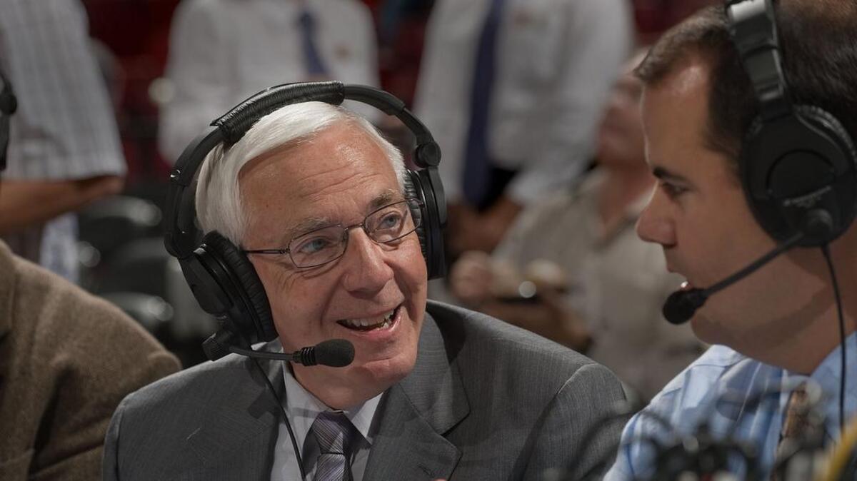 Gary Gerould converses with a broadcaster prior to the game between the Sacramento Kings and the Toronto Raptors at Arco Arena in Sacramento, Calif., on Monday, November 1, 2010.