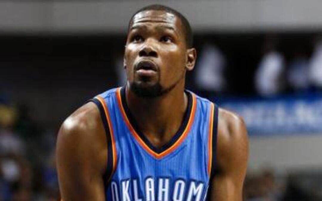 Thunder forward Kevin Durant (35) at the free-throw line in preseason play. The NBA’s top scorer is sidelined with a surgically repaired foot.