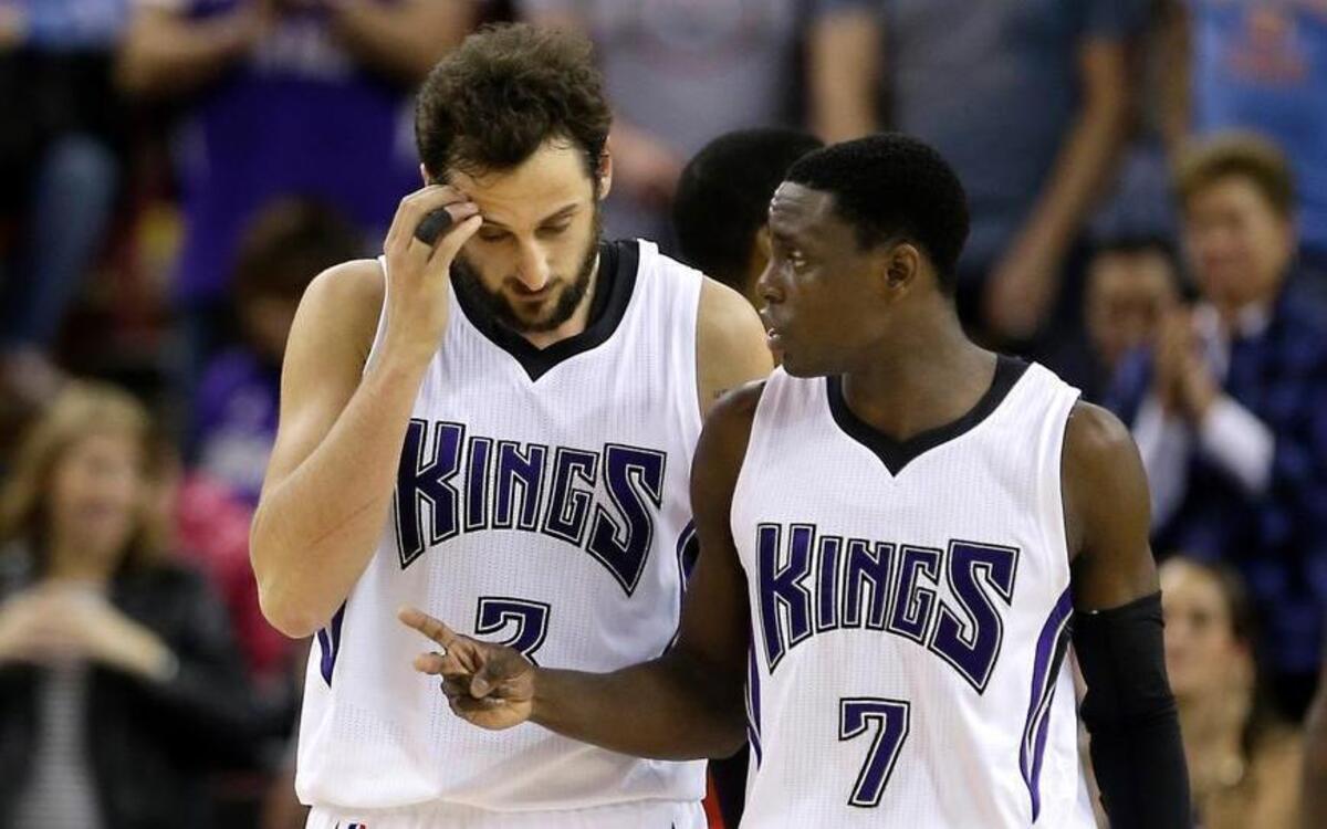 Sacramento Kings guard Marco Belinelli, left, and Darren Collison talk while on a timeout during a game against the Chicago Bulls on Wednesday, Feb. 3, 2016, in Sacramento, Calif.