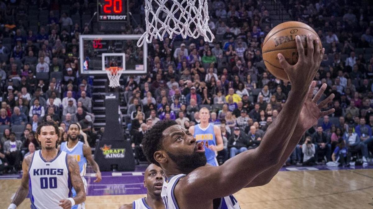 Sacramento Kings guard Tyreke Evan goes up for a basket in February against the Denver Nuggets. Evans says he’s feeling no pain from past knee injuries.