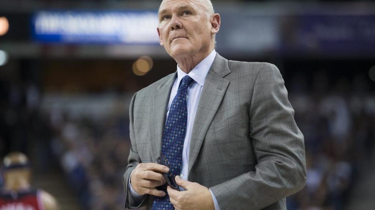 Kings coach George Karl looks at the scoreboard late against the Washington Wizards during the Kings 109-86 win at Sleep Train Arena on March 22 in Sacramento.